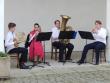 žesťové kvarteto Happy Brass v podloubí nádvoří konventu